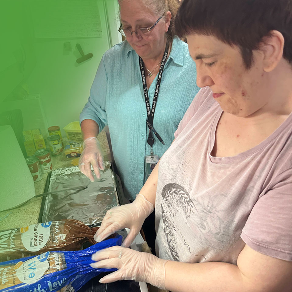 2 women making lunch